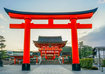 Fushimi Inari Shrine  at sunrise, Kyoto, Japan. The japanese on the building means Fushimi Inari Shrine. 