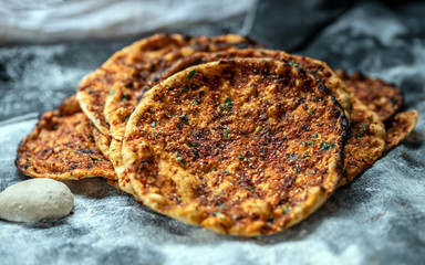 Preparation of organic tandoor bread and layered bread, one of the local flavors of Antioch