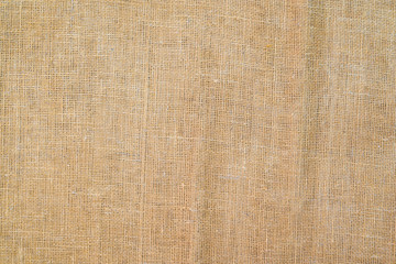 Brown sackcloth texture. or Background of Natural Brown Fabric Sack weaving is a bag. Vintage abstract Hessian or sackcloth fabric or hemp sack texture background.