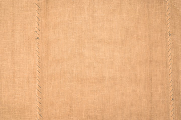 Brown sackcloth texture. or Background of Natural Brown Fabric Sack weaving is a bag. Vintage abstract Hessian or sackcloth fabric or hemp sack texture background.