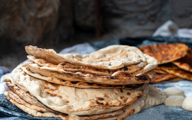 Preparation of organic tandoor bread and layered bread, one of the local flavors of Antioch