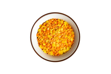 Yellow lentils in bowl isolated on white background