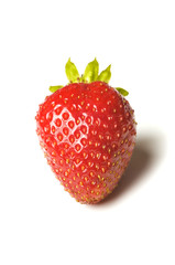 Fresh ripe red strawberry with green leaves on white background with dropped shadow. Studio shot
