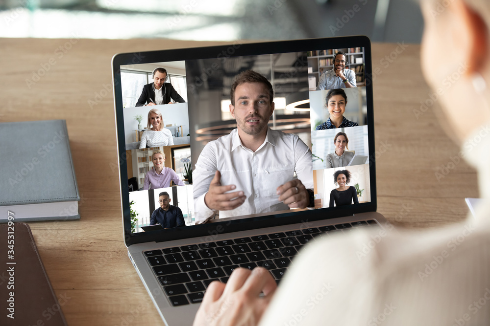 Poster Close up of woman worker talk brainstorm on video call on computer with diverse colleagues, have online team briefing together, female employee engaged in webcam conference on laptop with coworkers