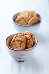 Butter cookies on bright wooden background. Copy space.	