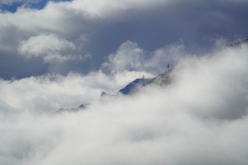 clouds and sun on the morning with window view to the mountains