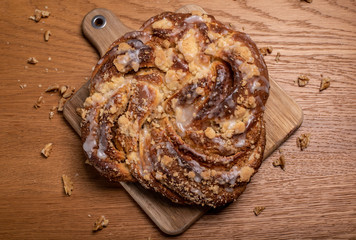 yeast homemade bun with crust and frosting