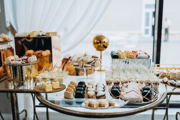 Candy bar. Table with sweets, candies, dessert