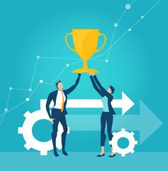 Business people holding up trophy winning symbol.