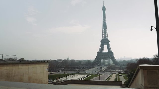 Paris, France / 04 13 2020 : Deserted Eiffel tower area during coronavirus / Covid-19 lockdown in Paris 4K