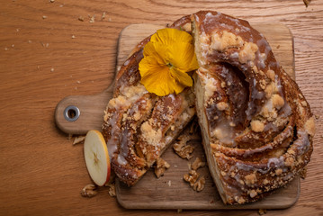 yeast homemade bun with crust and frosting