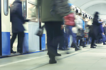crowd of people metro in motion blurred, abstract background urban traffic people
