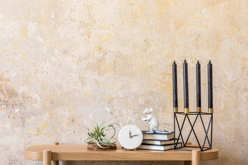 Interior design of living room with wooden console,  candles, books, air plants, copy space,...