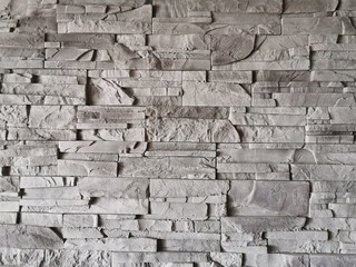 Obraz premium Szara ściana z kamienia