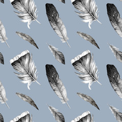 Seamless pattern of hand-drawn various feathers. Black and white feathers of different birds on a colored background. For wrapper, textile, wallpaper, napkin
