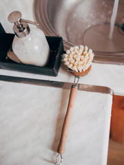 zero waste dish washing brush on the kitchen table