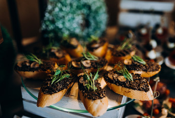 Mini Canapes on Buffet Table. Canapes with pate on a buffet table