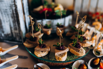 Mini Canapes on Buffet Table. Canapes with pate on a buffet table