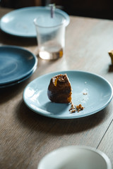 Cinnamon roll on a blue plate