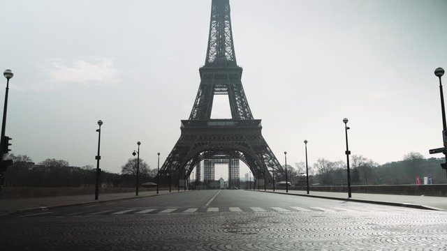 Deserted Eiffel tower during coronavirus / Covid-19 lockdown in Paris, france 4K