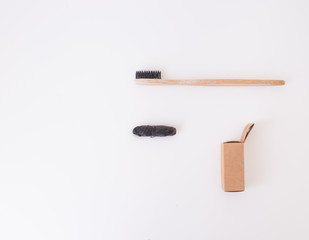 zero waste dental floss with bamboo toothbrush and box