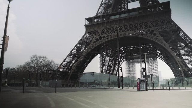 Paris, France / 04 13 2020: Deserted Eiffel tower during coronavirus / Covid-19 lockdown in Paris, france 4K