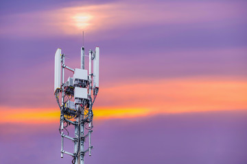 Antenna and Transceiver 5G, 4G on sunset background.