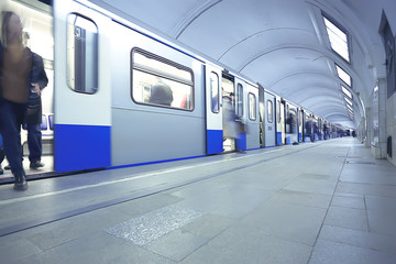 crowd of people metro in motion blurred, abstract background urban traffic people