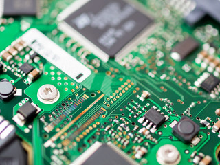 Macro photo of hard disk controller board. IT detail in computer.