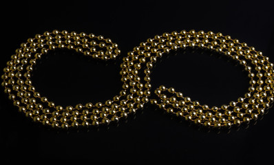 Installation of beads in the form of a symbol of infinity.