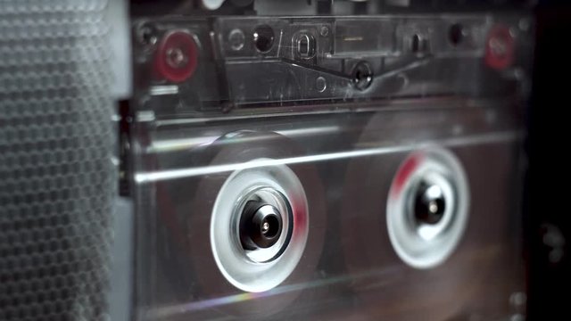 vintage audio cassette fast forwarding from start to finish in tape deck