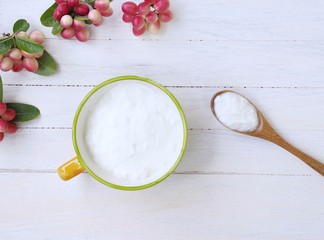 fresh yogurt with berries Natural yogurt probiotic on white wood concept healthy