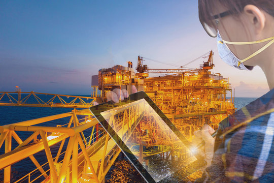 Double Exposure Of Asian Engineer Or Technician Woman Wearing N95 Mask While Using Tablet With Offshore Platform Protection Against Contagious Disease, Coronavirus For Industrial Business Concept