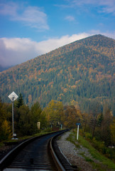Autumn / mountains / forest / railway / train / signs / mountain / trees