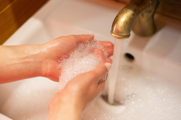 Fototapeta premium Hand wash with soap, cleanliness and hygiene 