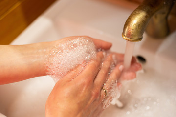 Fototapeta premium Hand wash with soap, cleanliness and hygiene 