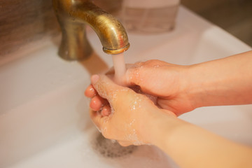 Fototapeta premium Hand wash with soap, cleanliness and hygiene 