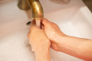Fototapeta premium Hand wash with soap, cleanliness and hygiene 