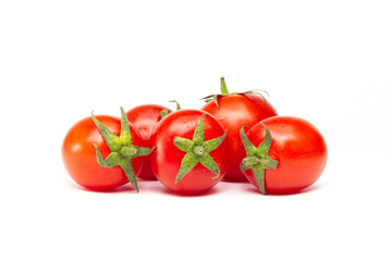 Red cherry tomatoes isolated on white