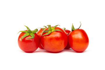 Red cherry tomatoes isolated on white