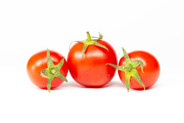 Red cherry tomatoes isolated on white