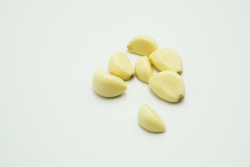 Fototapeta na wymiar Garlic or Allium sativum, shots on isolated white background.