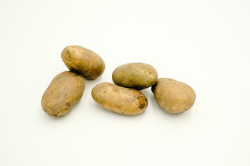 Fototapeta na wymiar Potatoes or Solanum tuberosum, shots on isolated white background.