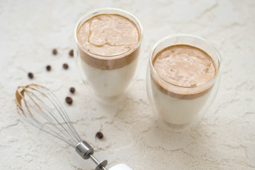 Making dalgona coffee. Whipped trendy coffee, trendy drink