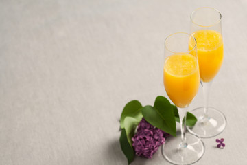 Two glasses of mimosa cocktail