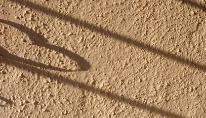 Modern blurred abstract background shadow of heart. Playing with sunlight. Valentine's day or love concept.