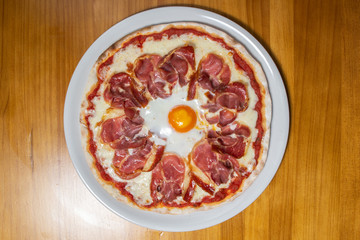 Pizza with egg and ham