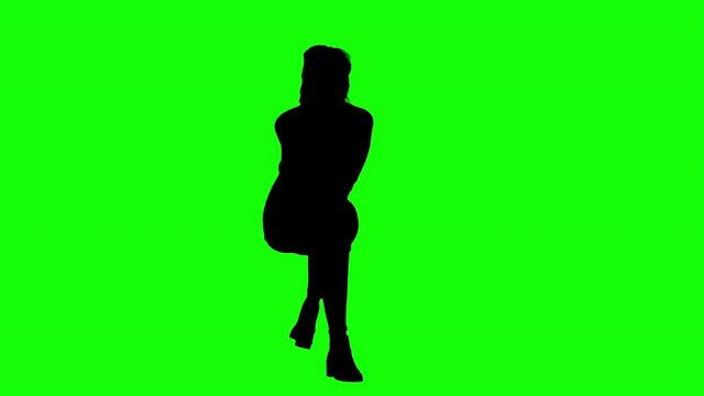 Girl Talking on The Phone While Sitting Green Screen Silhouette