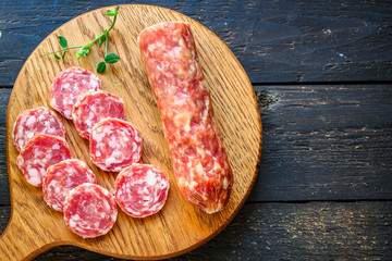 smoked sausage Fuet meat product Menu concept healthy eating. food background top view copy space...