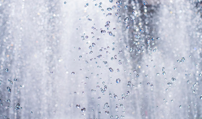 Naklejka na ściany i meble photo of water droplets in the air